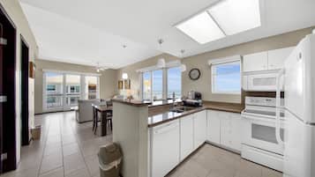 Luxury Suite, 2 Bedrooms | Private kitchenette | Coffee/tea maker
