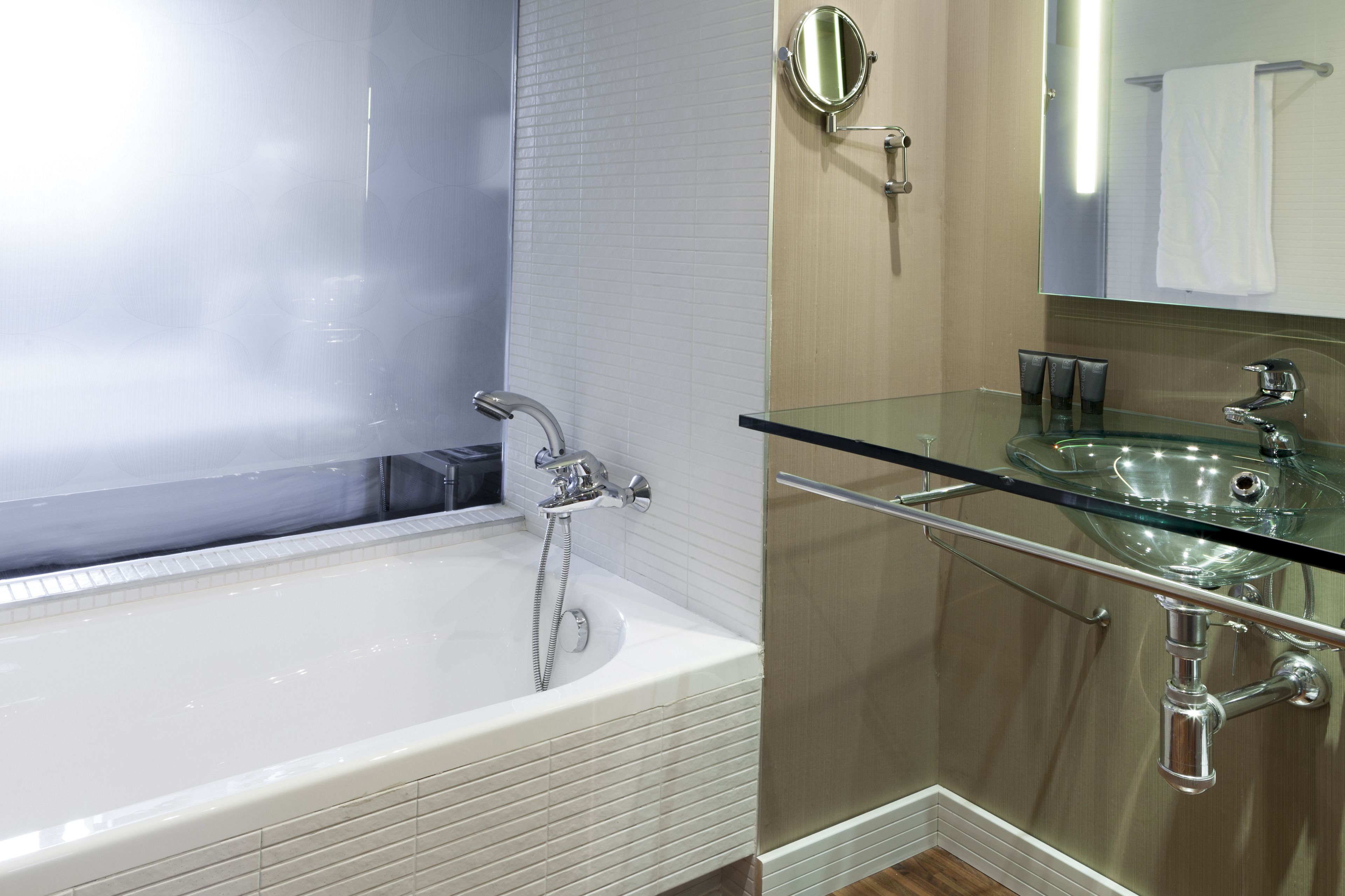 separate bathtub and shower, free toiletries, hair dryer, bathrobes