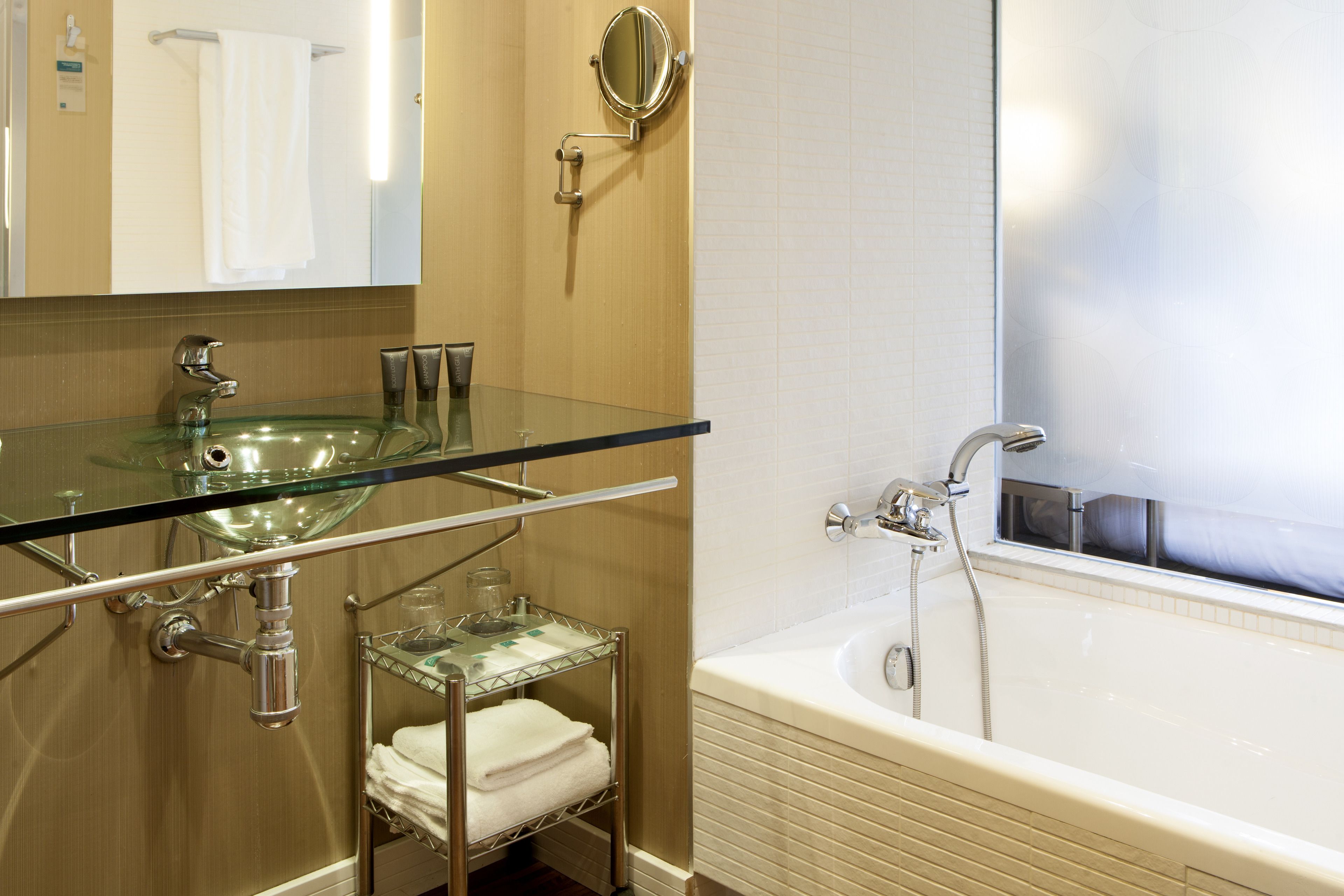 separate bathtub and shower, free toiletries, hair dryer, bathrobes