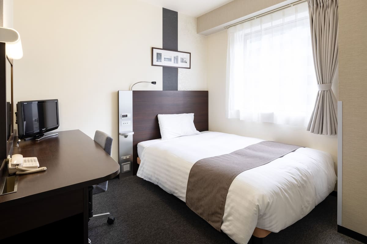 Premium bedding, desk, blackout curtains, soundproofing