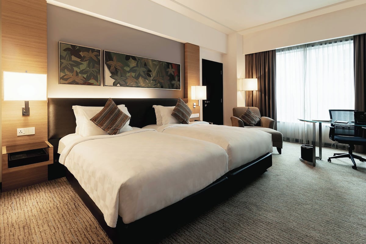 Chambre Club, 2 lits une place (Deluxe)