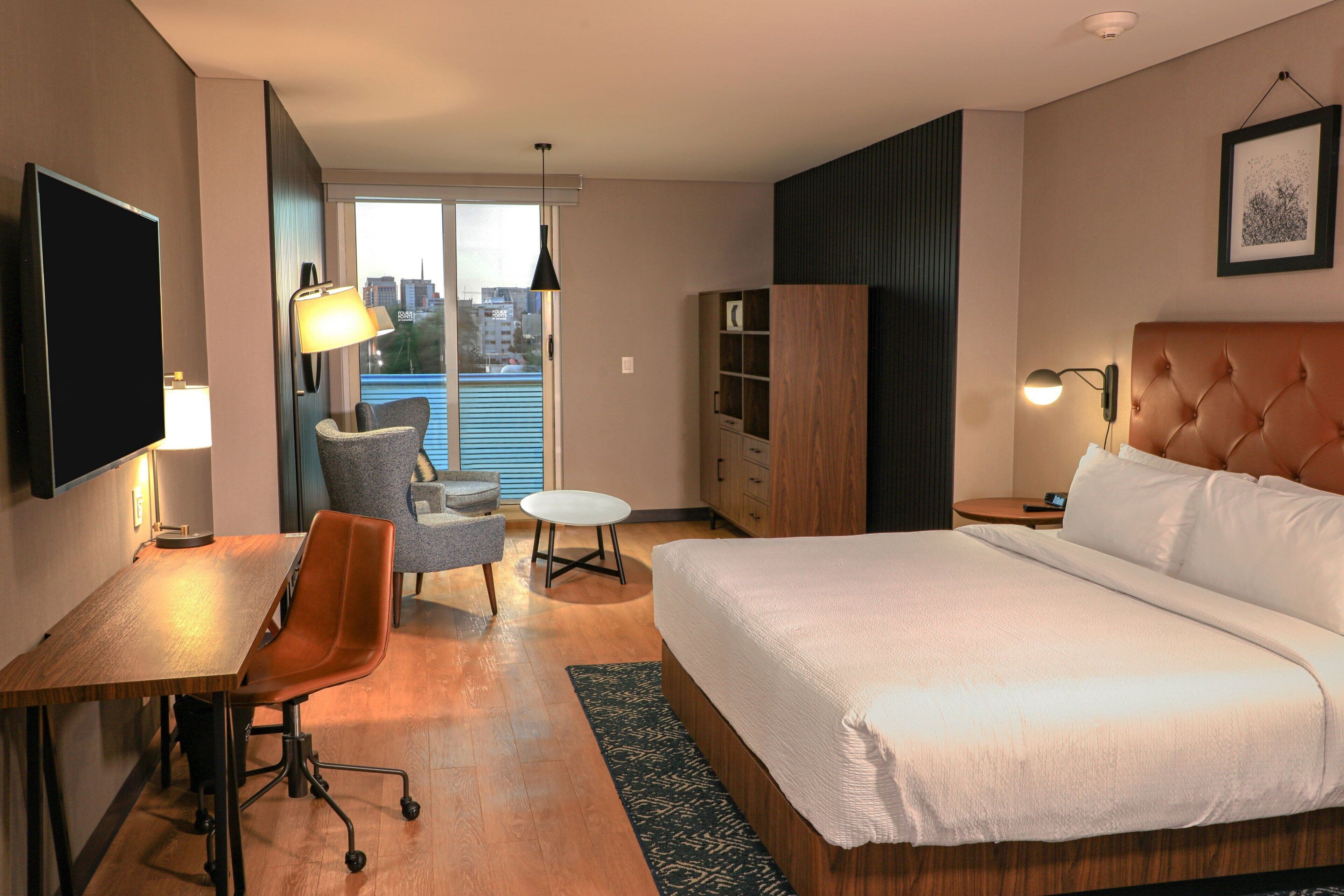 junior suite, 1 king bed, city view | city view