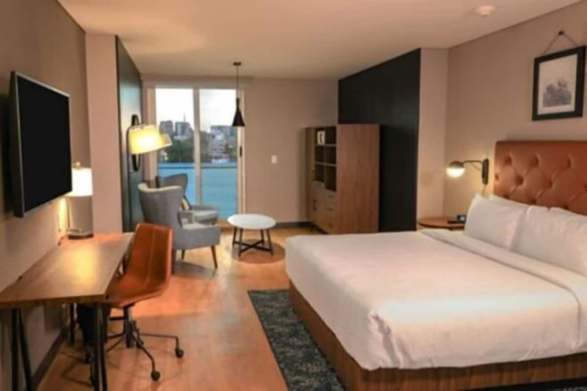 Premium bedding, down duvets, Select Comfort beds, in-room safe