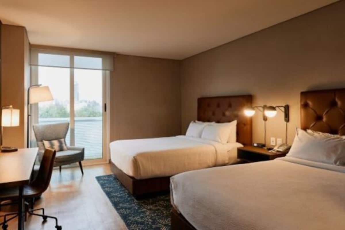 Premium bedding, down duvets, Select Comfort beds, in-room safe