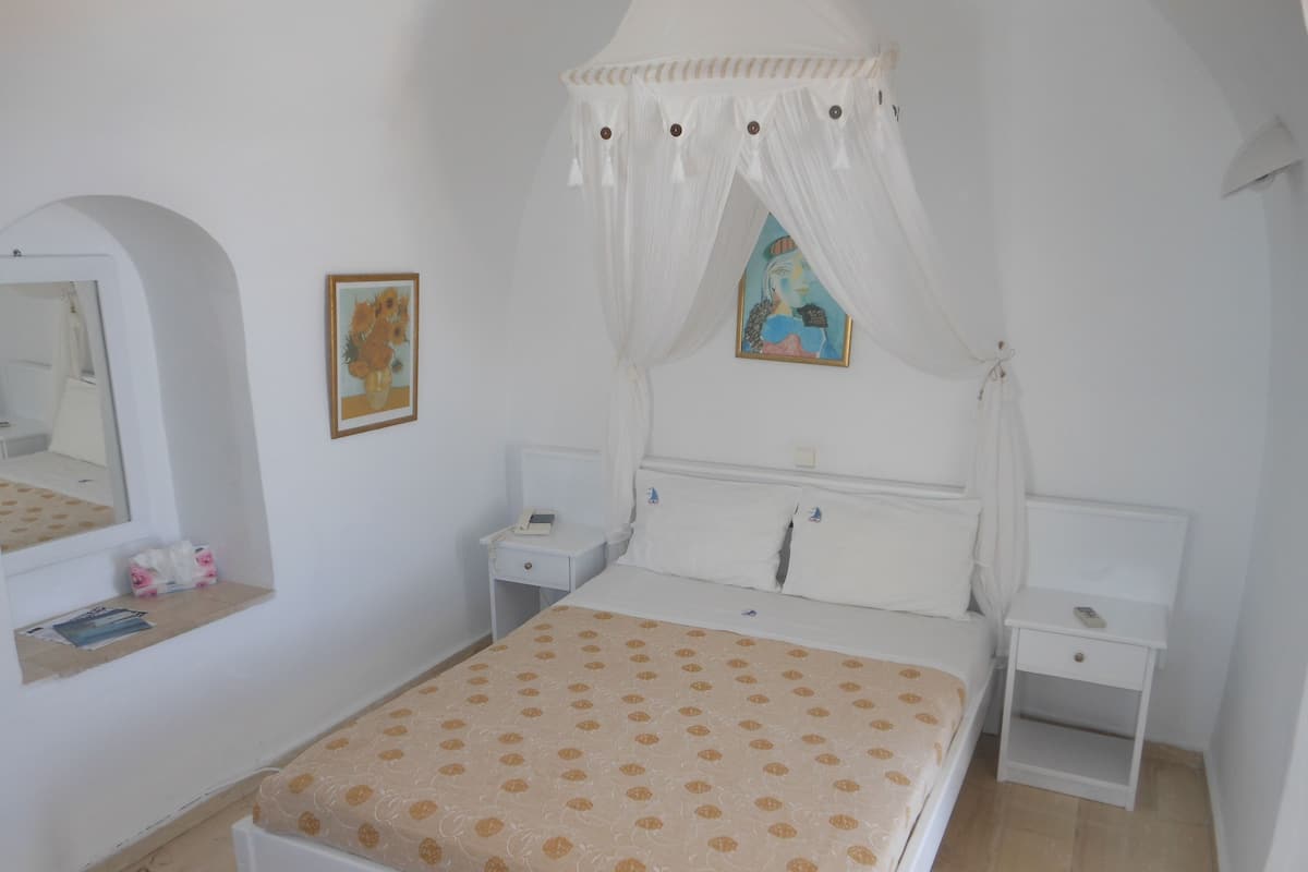 Basic Studio, Pool View, Poolside | 1 bedroom, in-room safe, blackout drapes, iron/ironing board