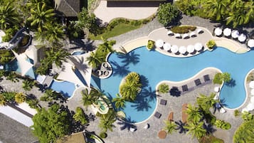 2 outdoor pools, open 7:00 AM to 7:00 PM, free cabanas, pool umbrellas