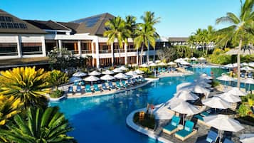 2 outdoor pools, open 7:00 AM to 7:00 PM, free cabanas, pool umbrellas