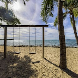 On the beach, beach cabanas, sun-loungers, beach umbrellas