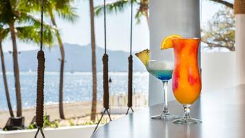 4 bars/lounges, 2 poolside bars, swim-up bar, beach bar