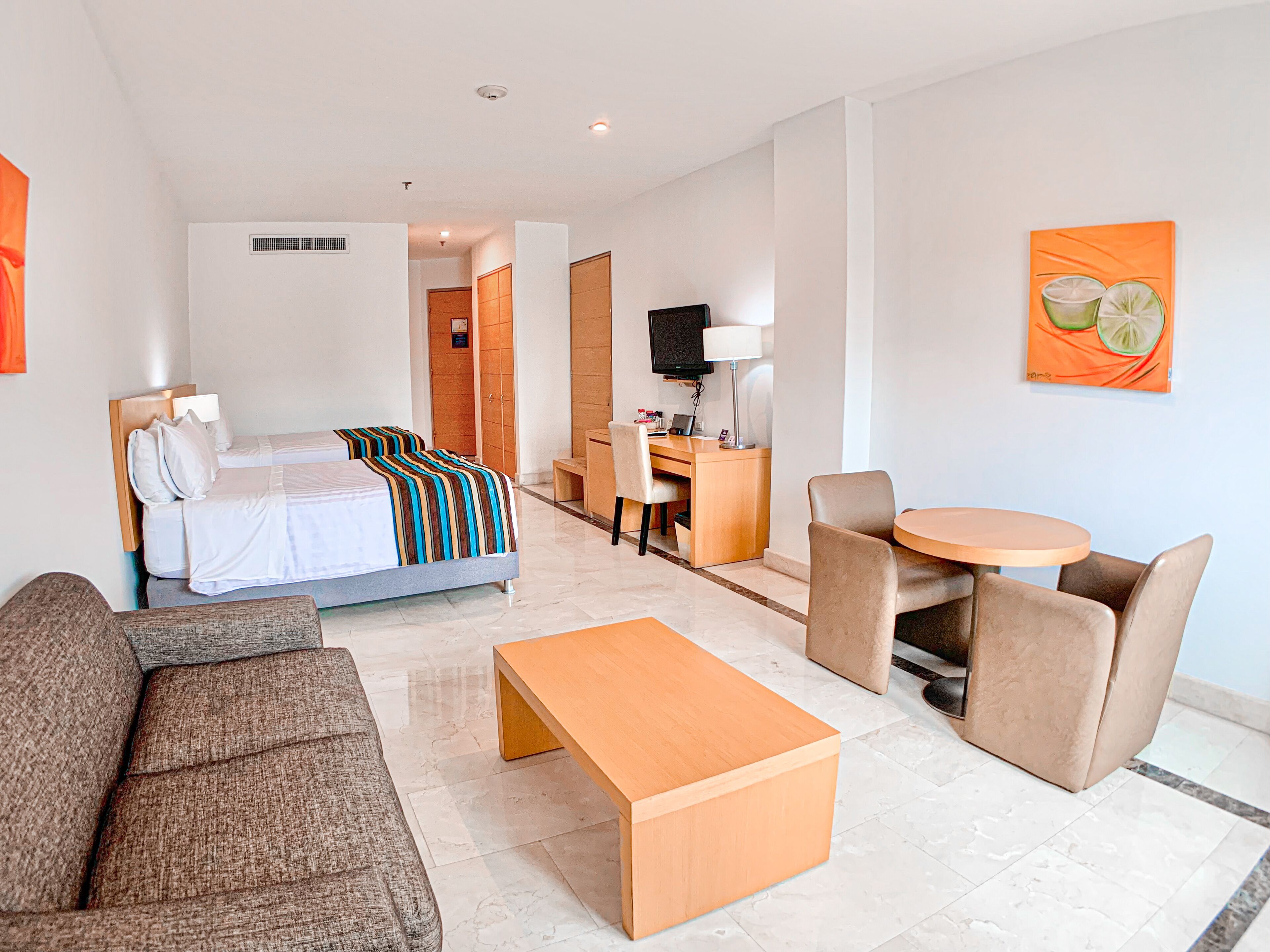 standard room, 2 double beds | living area | 32-inch lcd tv with satellite channels, tv