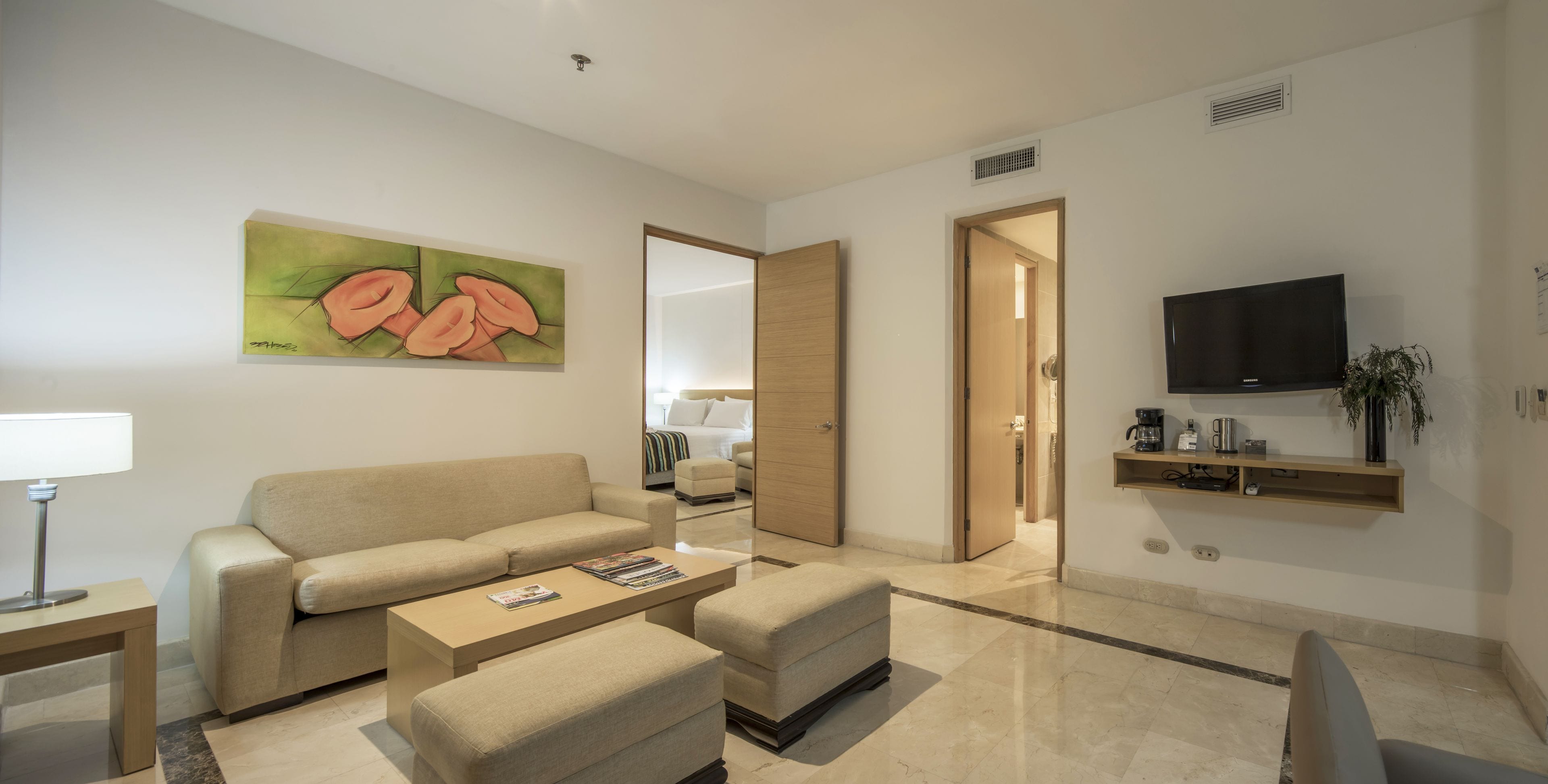 grand suite | living room | 32-inch lcd tv with satellite channels, tv