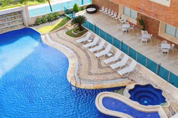 Outdoor pool, open 8:00 AM to 6:00 PM, pool umbrellas, sun loungers