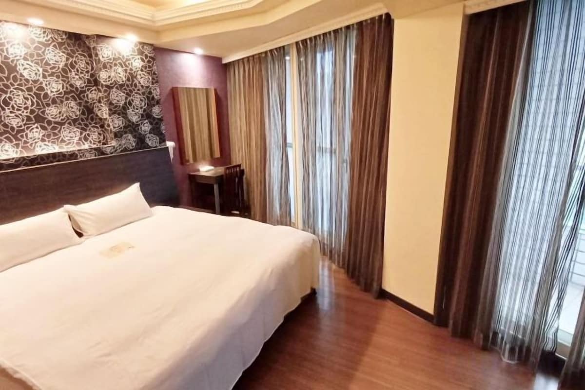 Blackout drapes, soundproofing, iron/ironing board (on request)