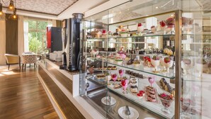 A bakery display case with various pastries and desserts. - Terrace Beach Resort - All Inclusive (Manavgat)