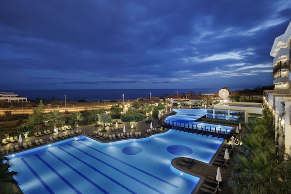 Indoor pool, seasonal outdoor pool, pool umbrellas, sun loungers