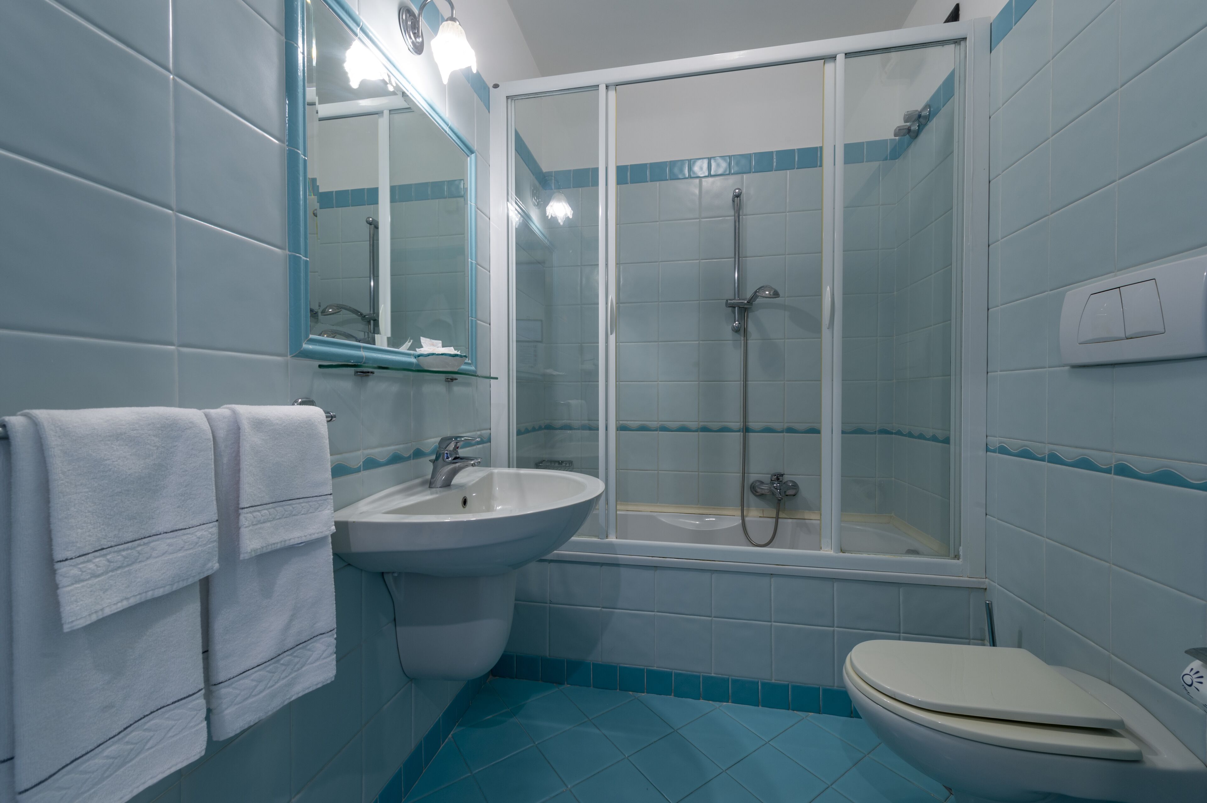 free toiletries, hair dryer, bidet, towels