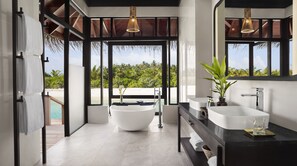 Deluxe Over Water Villa | Bathroom | Separate bathtub and shower, deep-soaking bathtub, rainfall showerhead - Anantara Veli Maldives Resort - Adults Only (Veligandu)