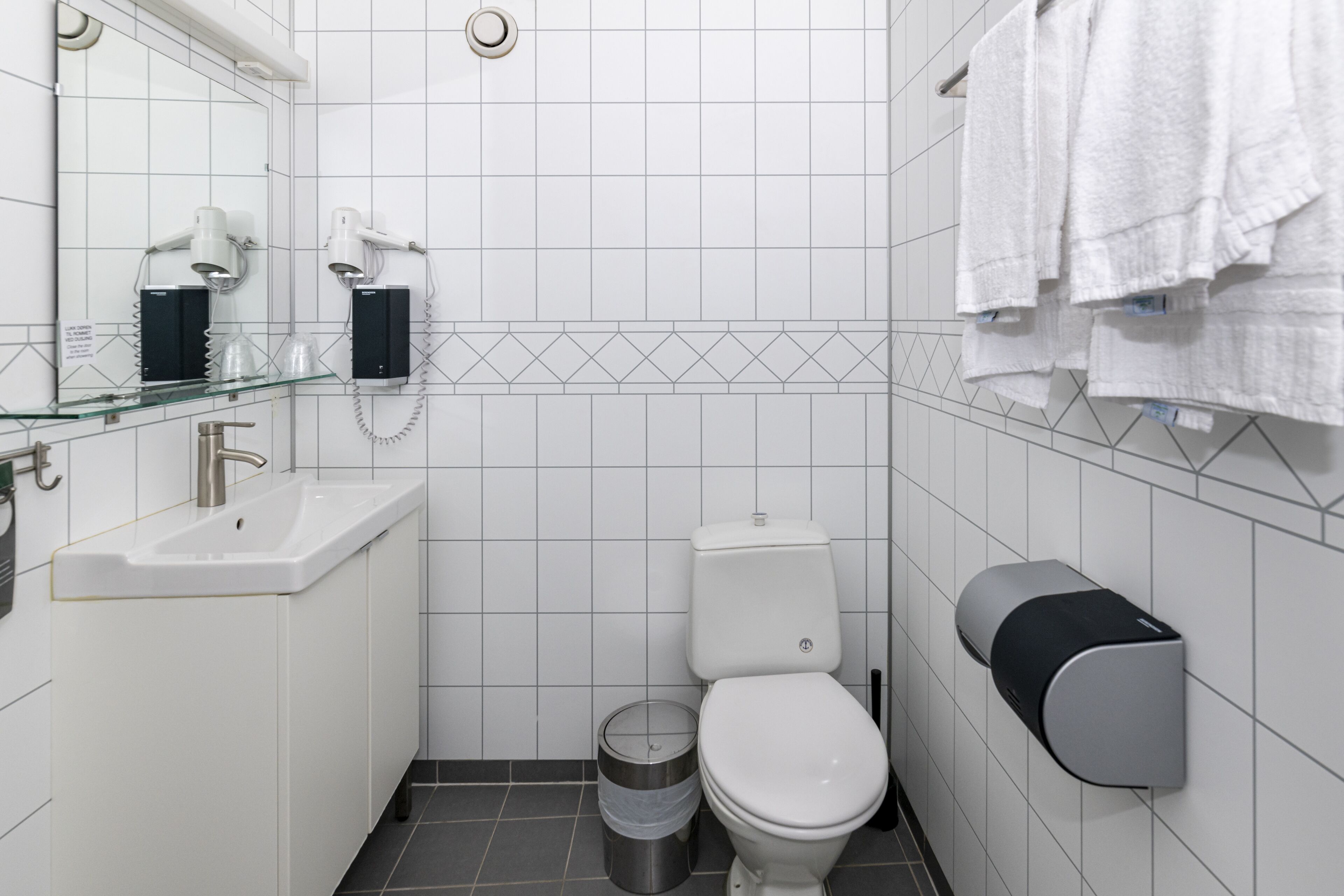 family room | bathroom | shower, hair dryer, towels