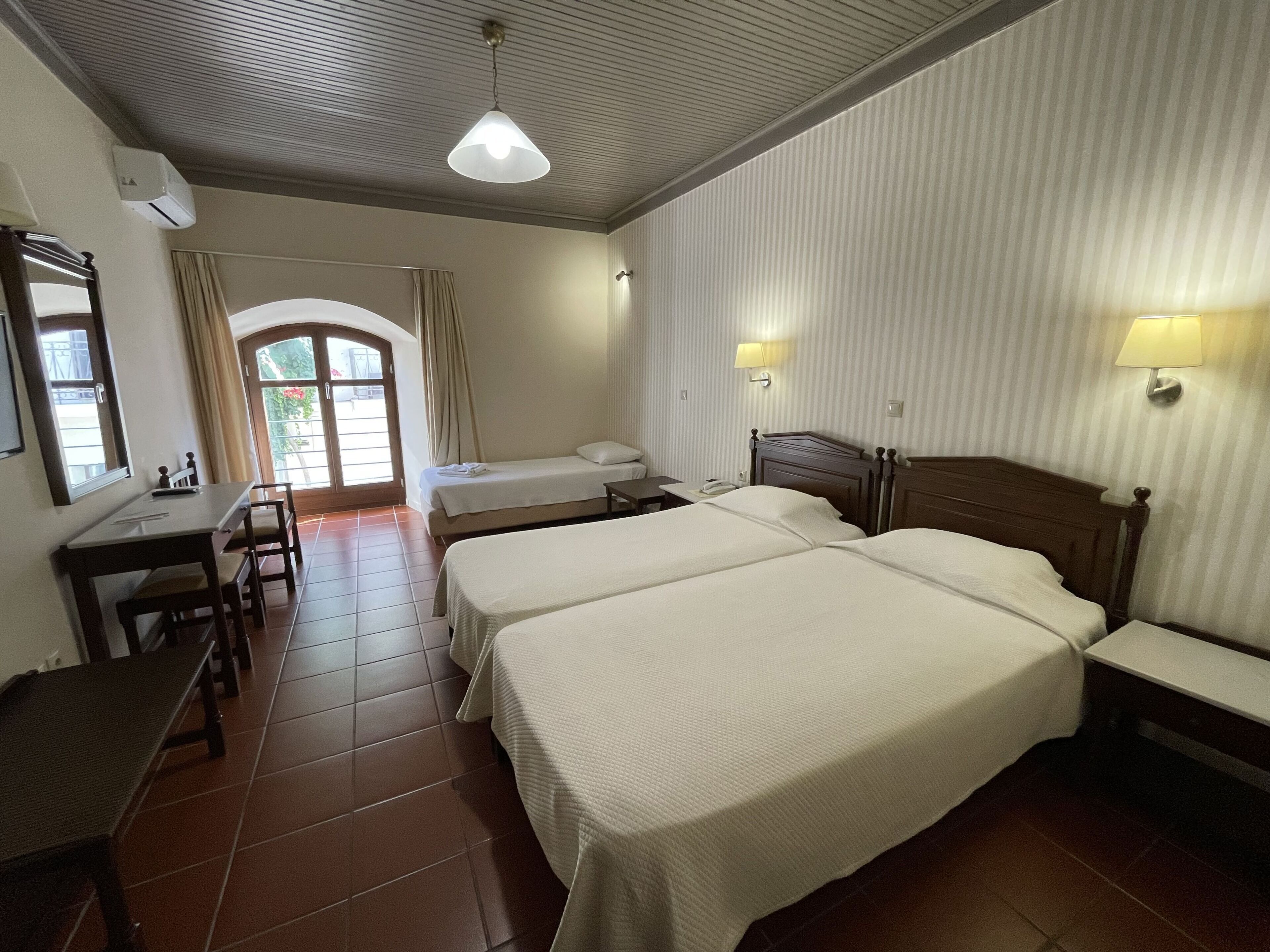 Desk, blackout curtains, free WiFi, bed sheets
