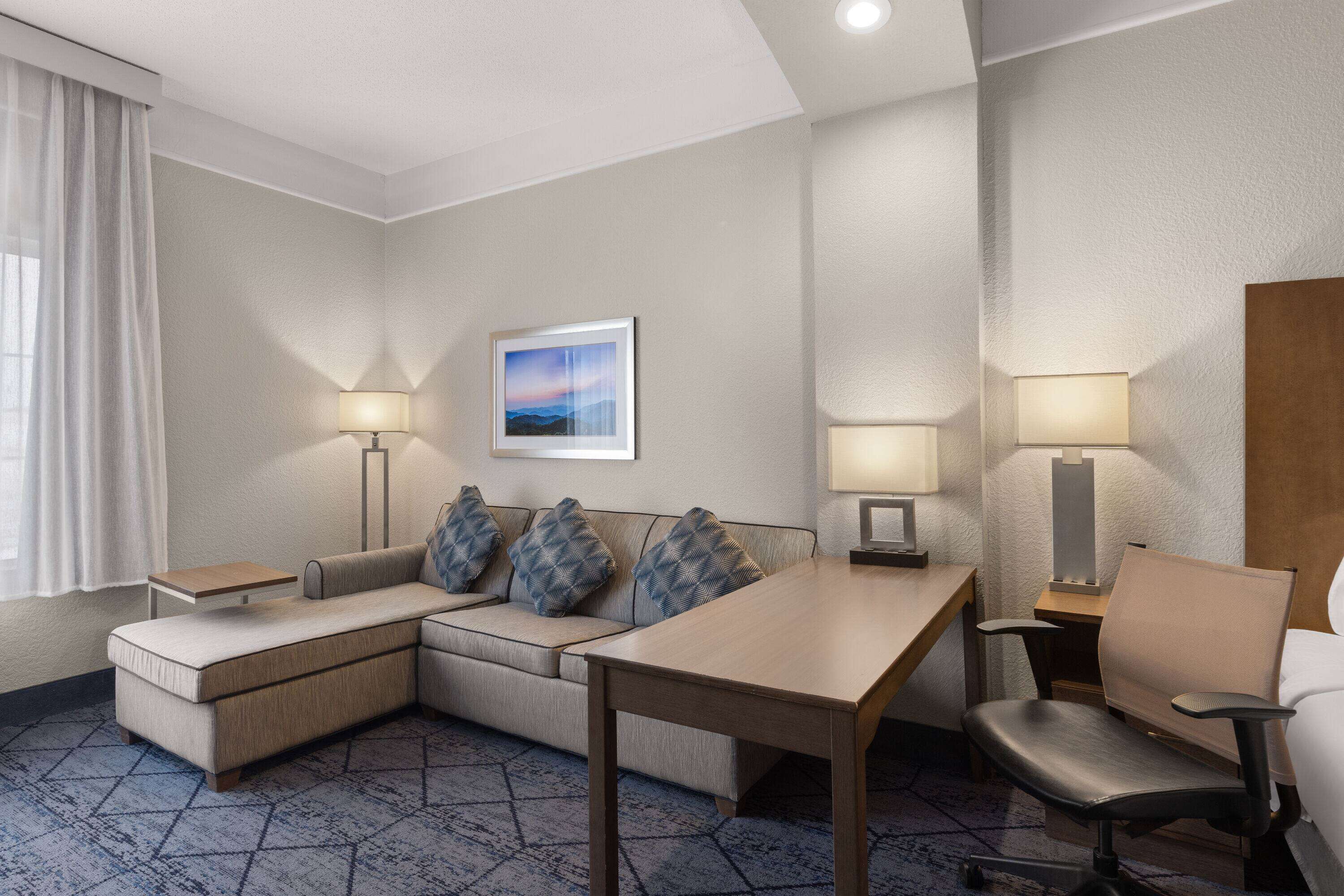 premium bedding, pillow-top beds, desk, blackout curtains