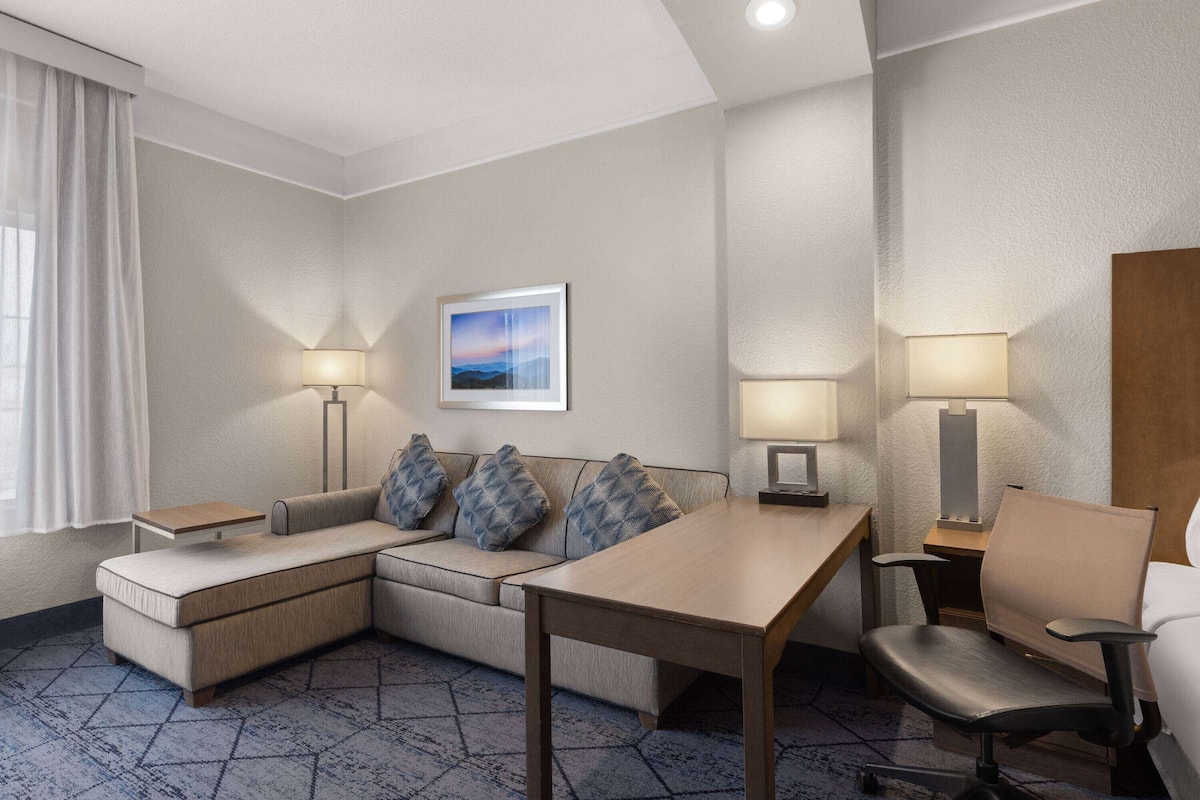 premium bedding, pillow-top beds, desk, blackout curtains