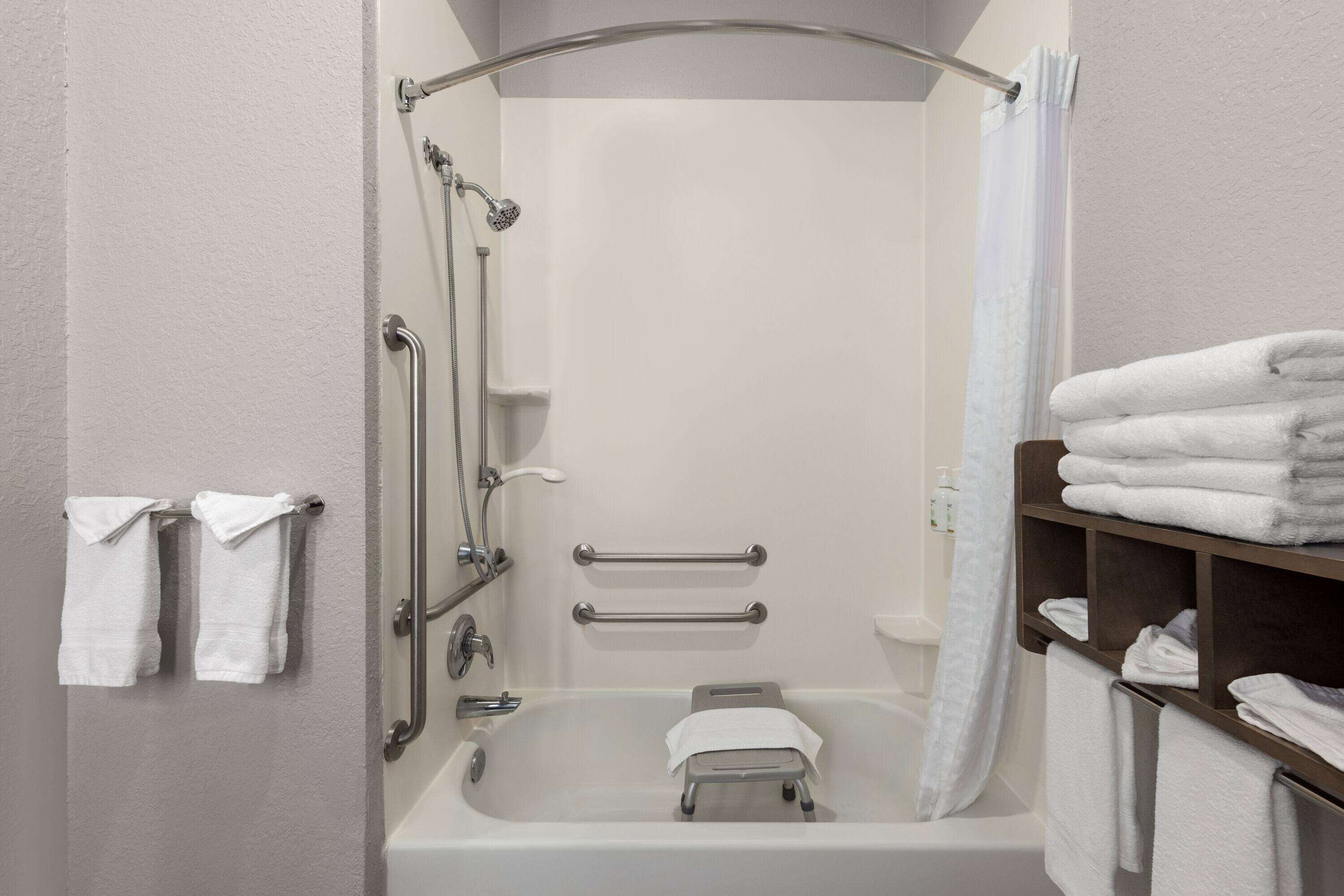 combined shower/bathtub, free toiletries, hair dryer, towels