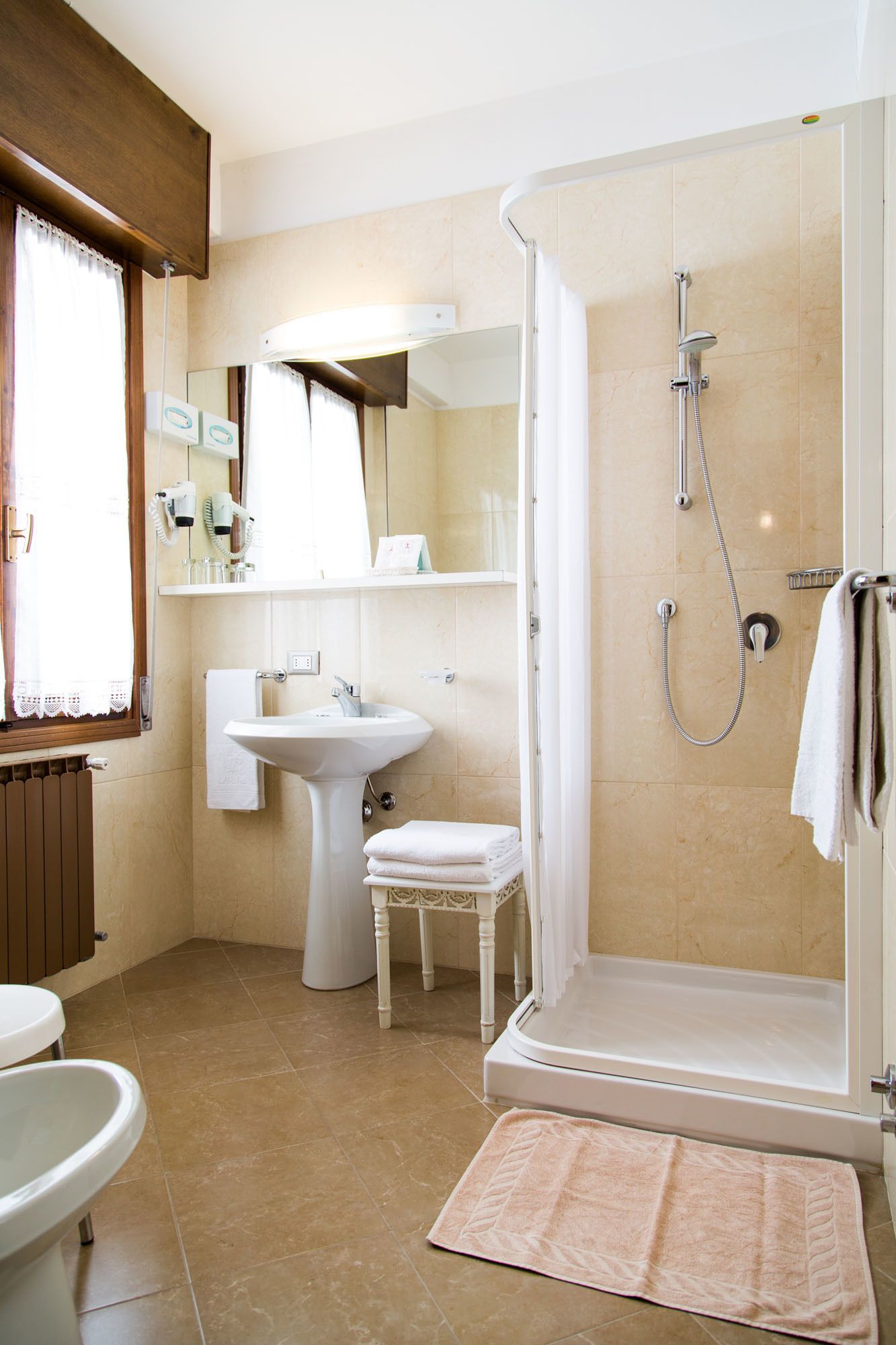 shower, free toiletries, hair dryer, bidet