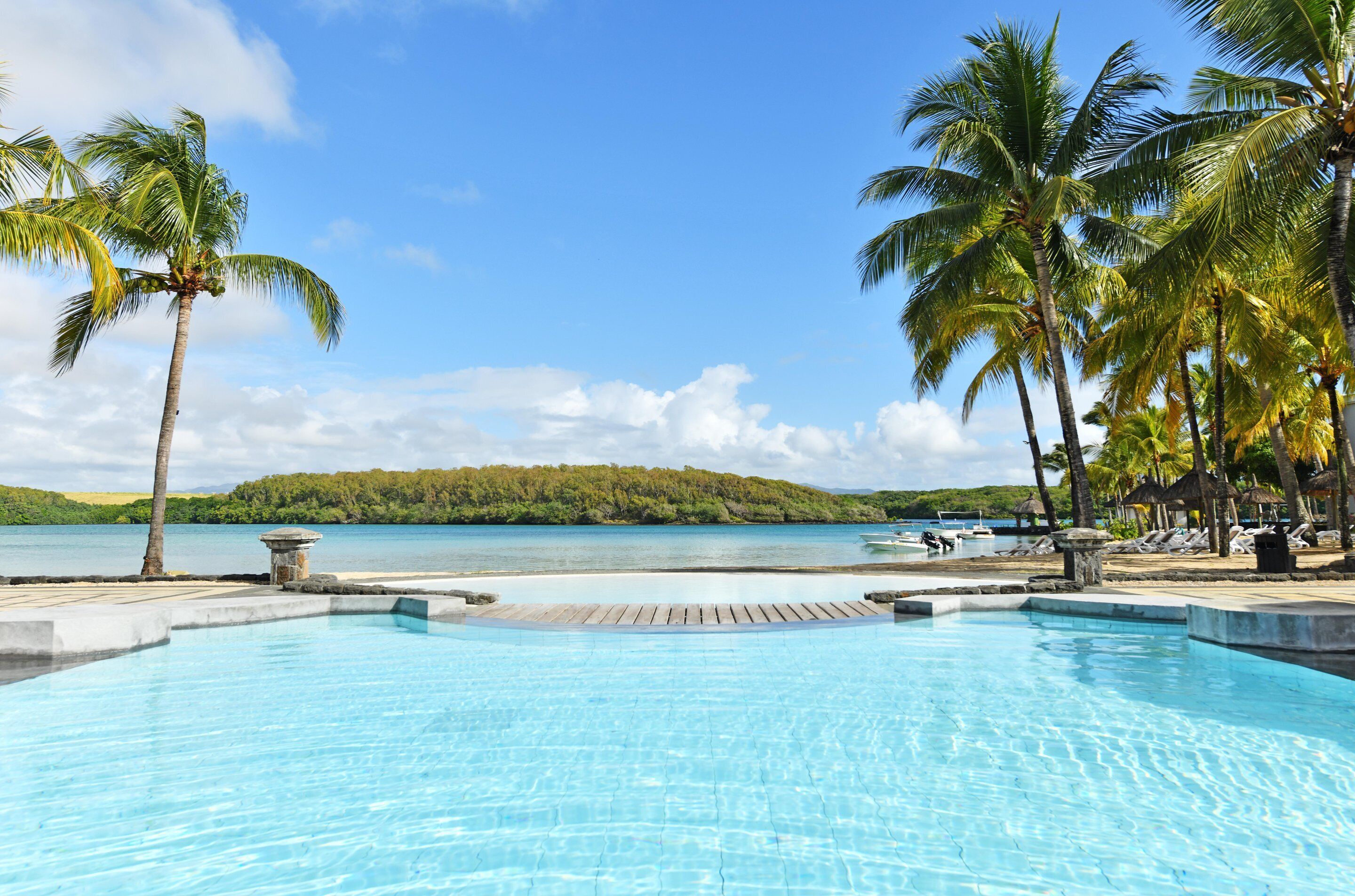 2 outdoor pools, pool umbrellas, pool loungers
