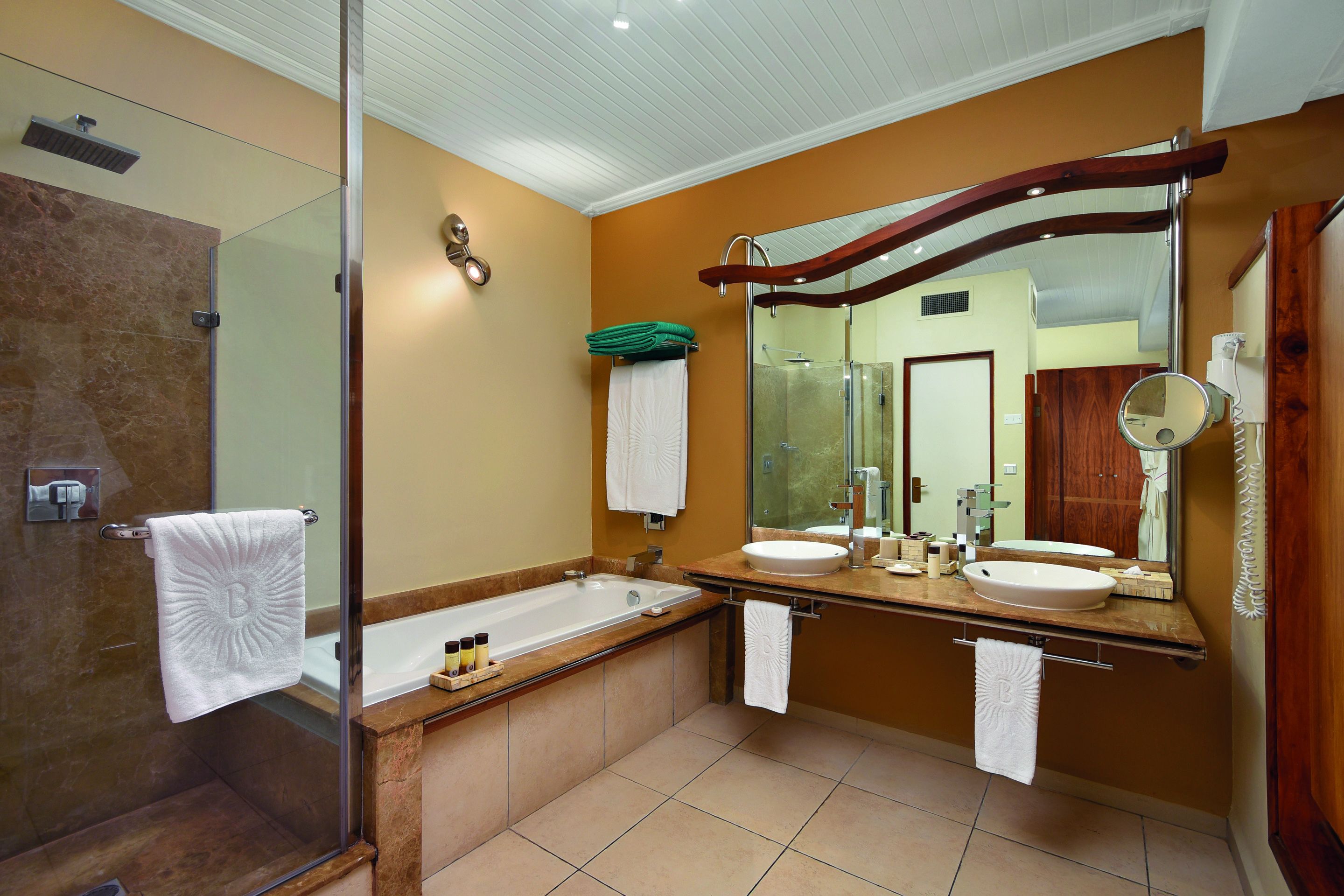 separate bathtub and shower, free toiletries, hair dryer, towels