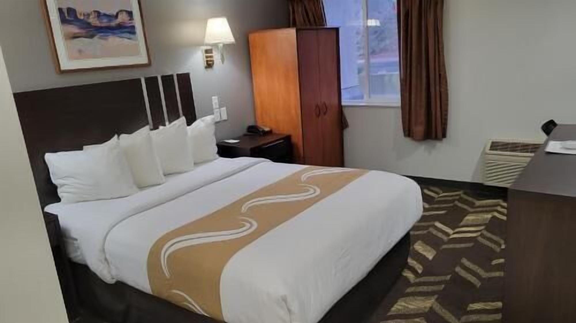 Desk, blackout curtains, free WiFi, bed sheets