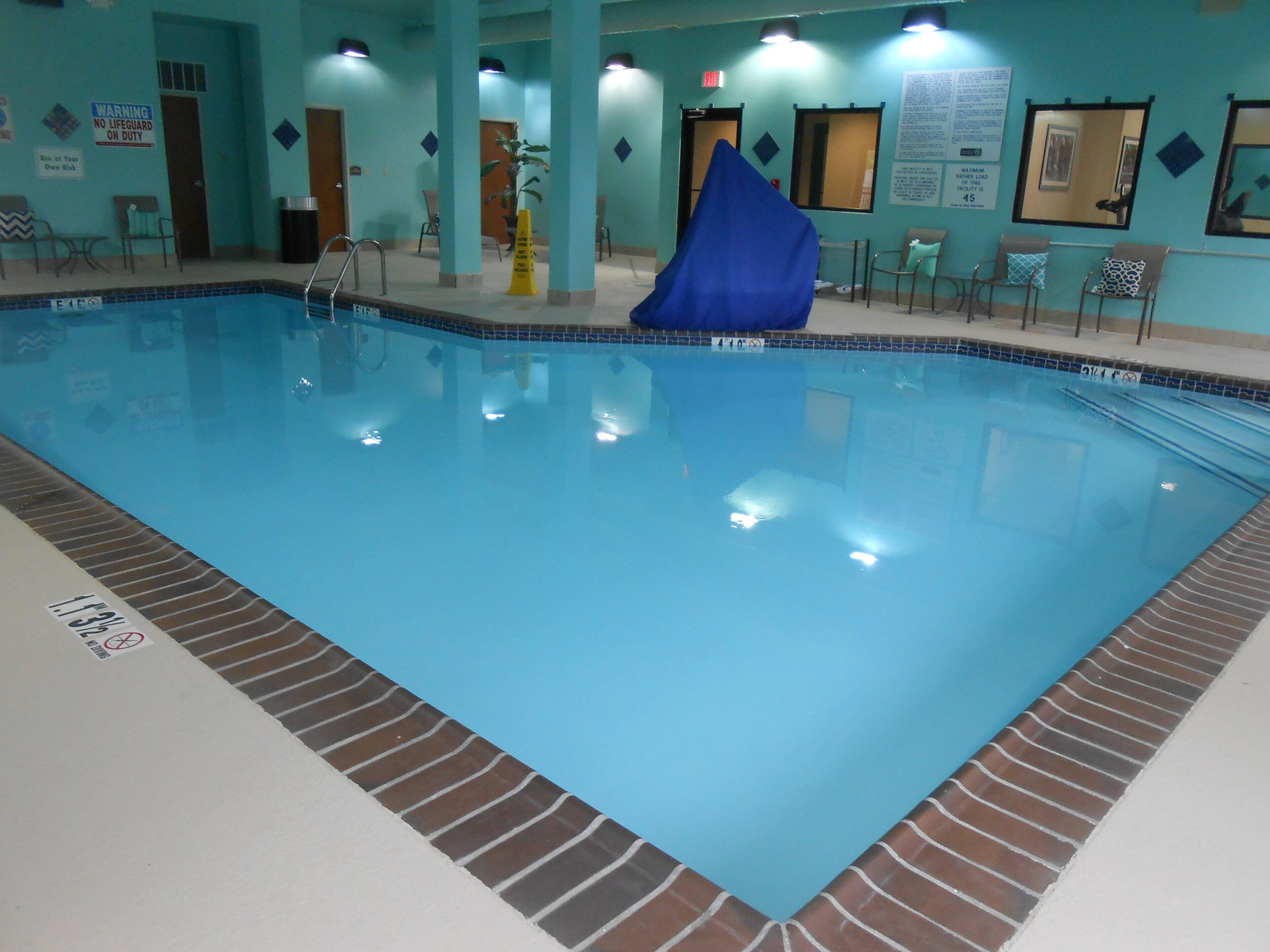 Indoor pool, open 7 AM to 10 PM, sun loungers