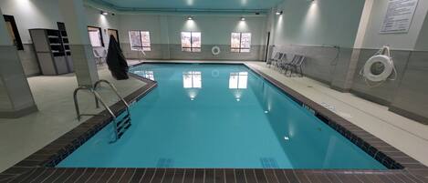 Indoor pool, open 7 AM to 10 PM, sun loungers
