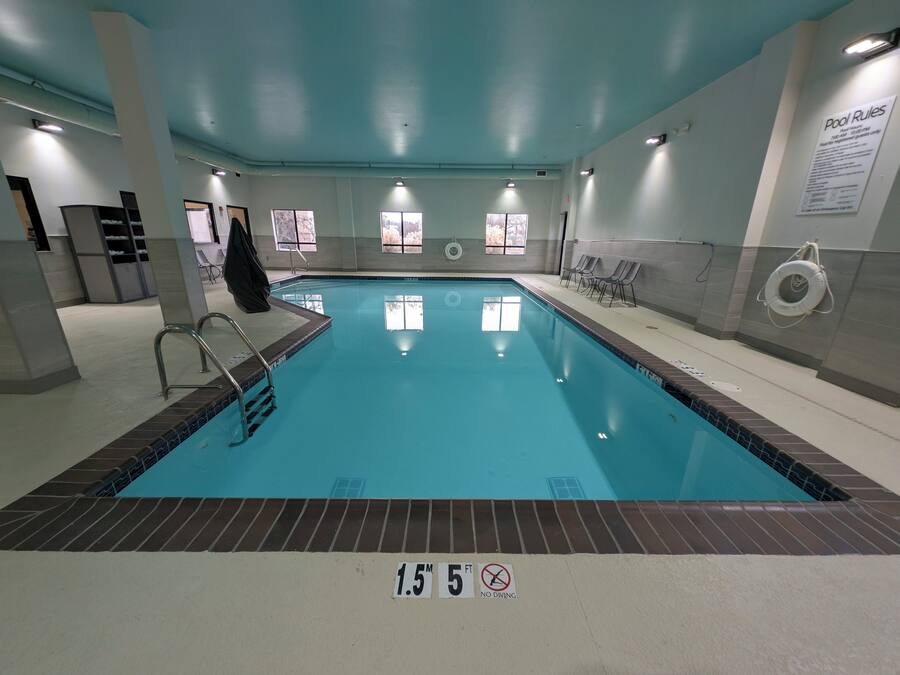 Indoor pool, open 7 AM to 10 PM, sun loungers