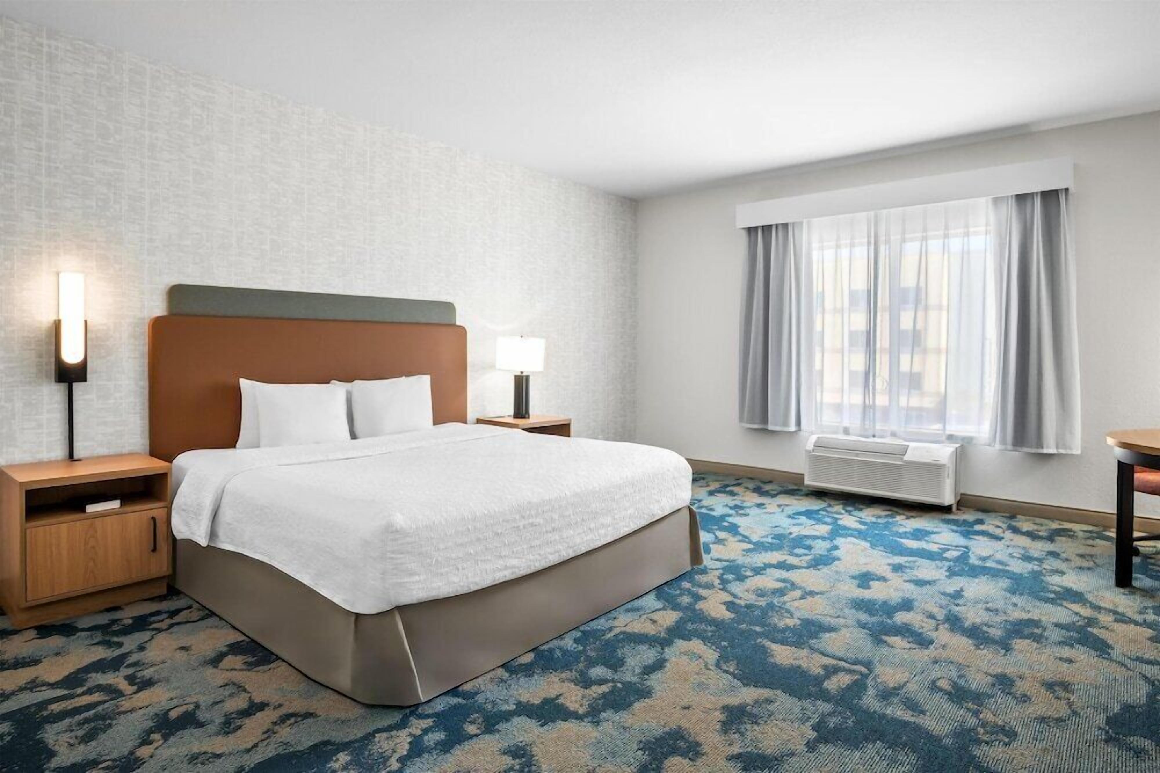 In-room safe, desk, blackout curtains, iron/ironing board