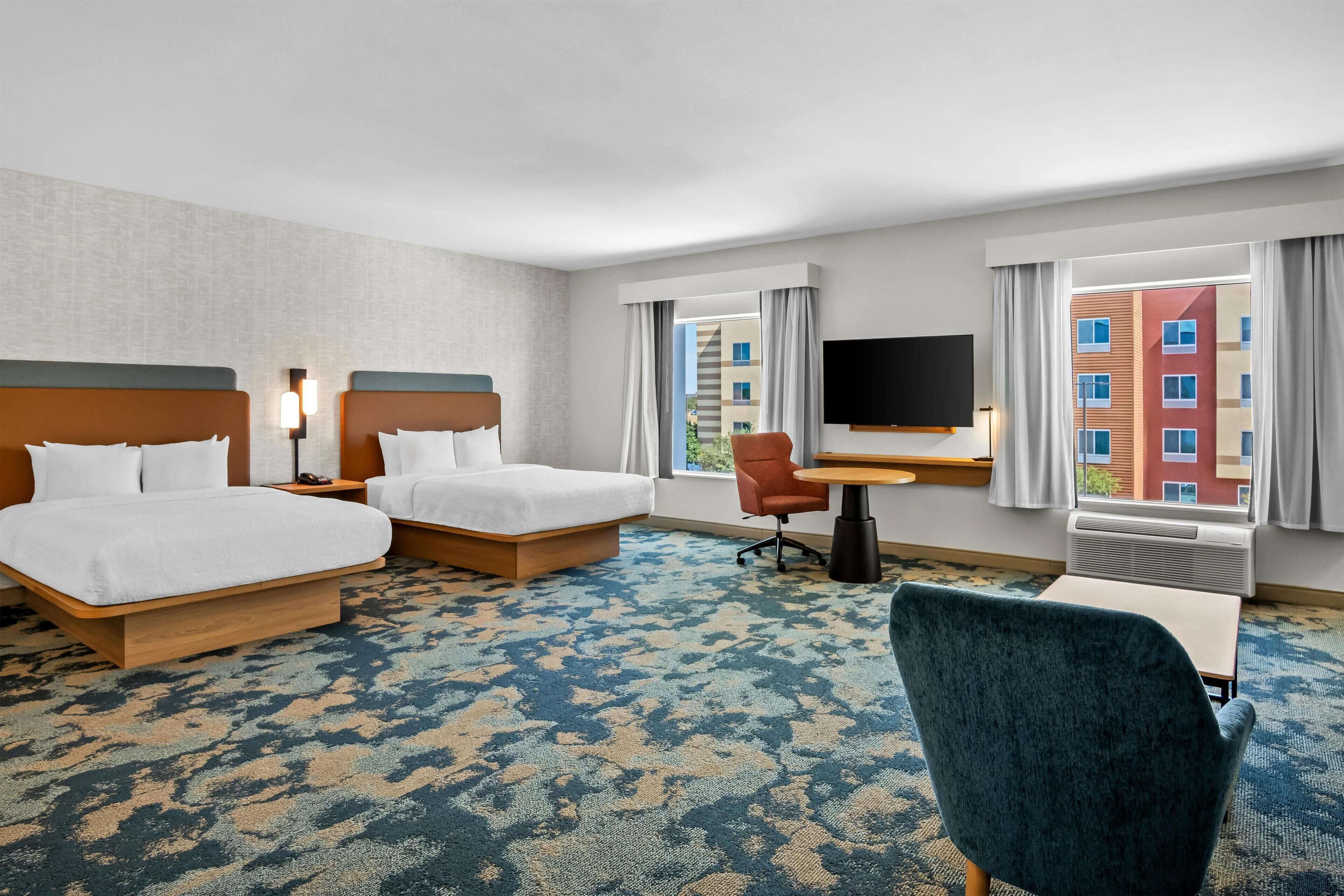 One Bedroom Suite, Two Queen Beds, Non-Smoking | In-room safe, desk, blackout curtains, iron/ironing board