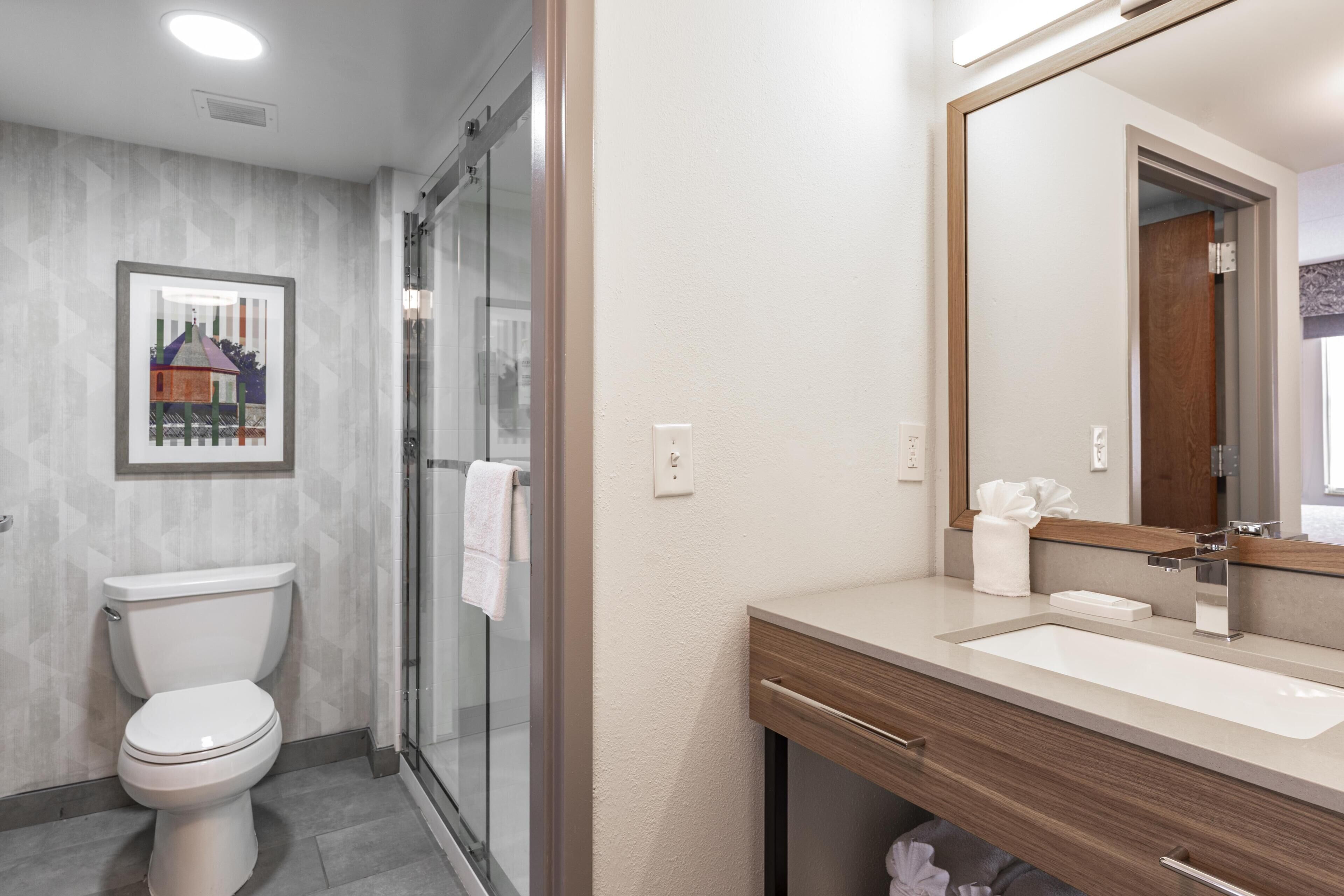 Signature Studio Suite, 1 King Bed with Sofa bed | Bathroom | Free toiletries, hair dryer, towels, soap