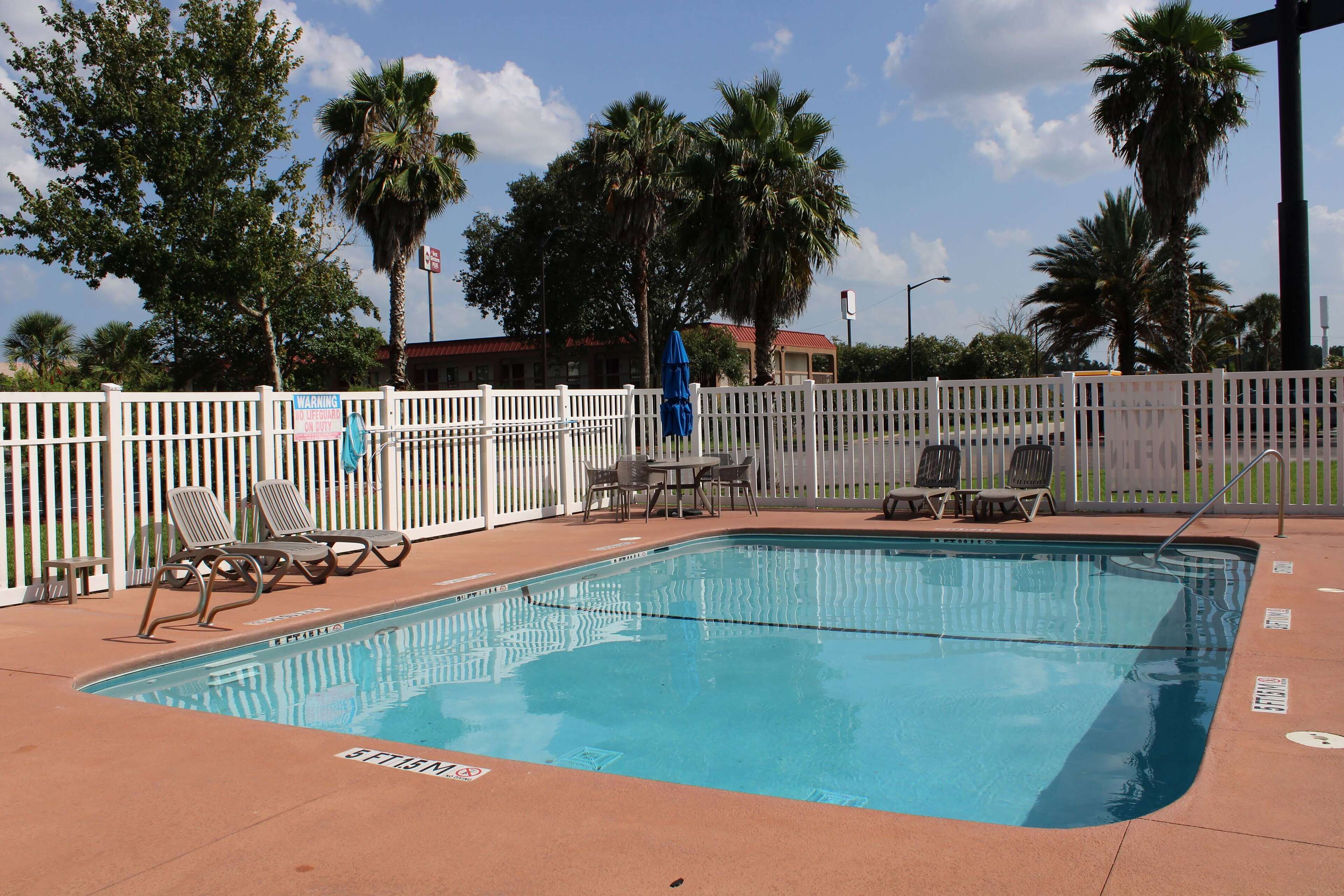Outdoor pool, open 8:00 AM to 10:00 PM, pool umbrellas, pool loungers