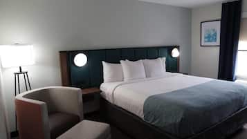 Hypo-allergenic bedding, desk, laptop workspace, blackout curtains