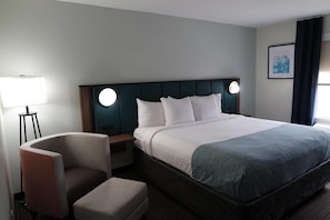 Hypo-allergenic bedding, desk, laptop workspace, blackout curtains