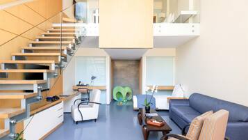 Suite familiar (Duplex) | Artículos del minibar gratis y caja de seguridad en la habitación