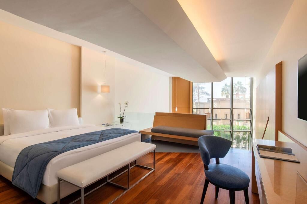 Free minibar, in-room safe, desk, blackout drapes