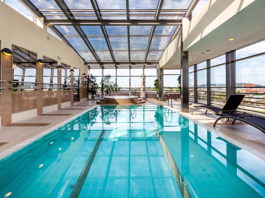 Indoor pool, open 7:00 AM to 10:00 PM, sun loungers