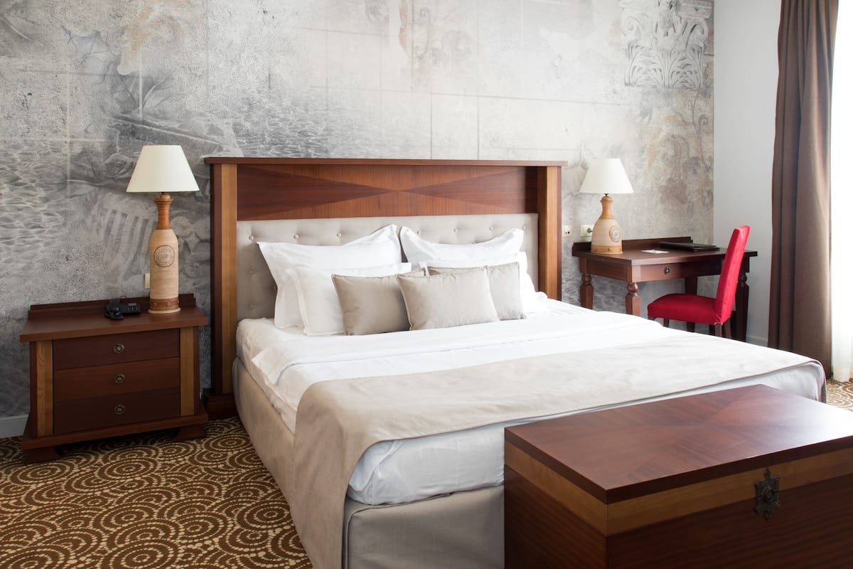 Deluxe Suite, 1 King Bed | Minibar, in-room safe, desk, laptop workspace