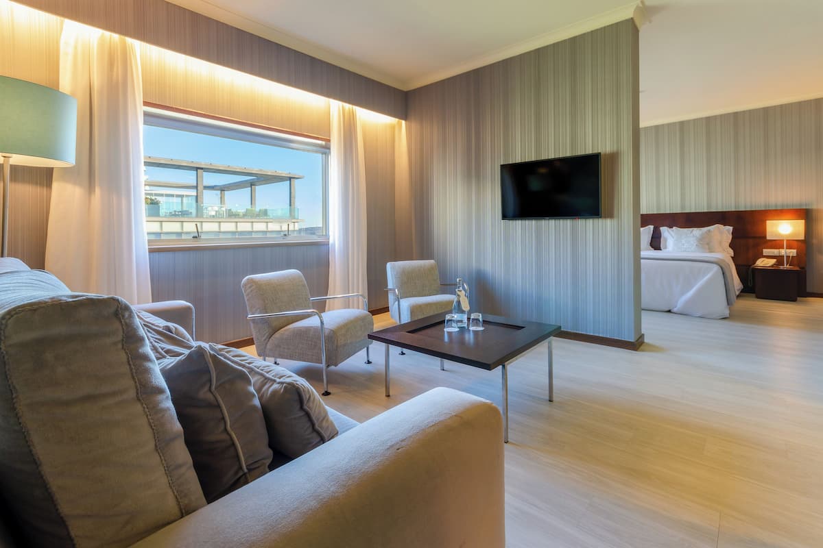 junior suite | minibar, in-room safe, desk, laptop workspace