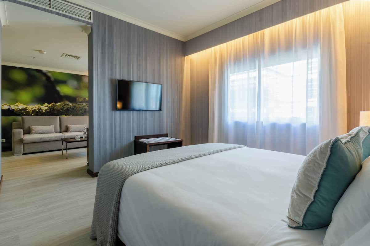 junior suite | minibar, in-room safe, desk, laptop workspace