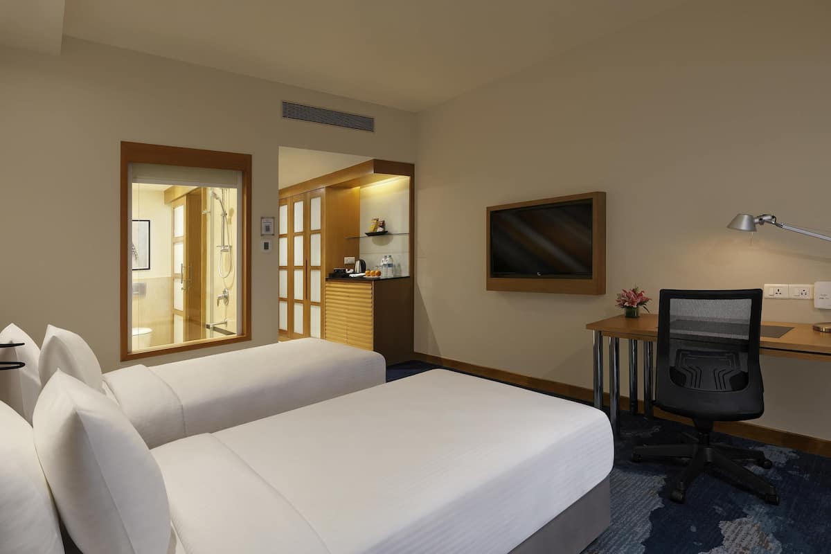 Standaard kamer, 2 eenpersoonsbedden | Luxe beddengoed, pillowtop-bedden, een minibar, een kluis op de kamer