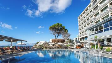 Outdoor pool, open 8:00 AM to 7:00 PM, pool umbrellas, sun loungers