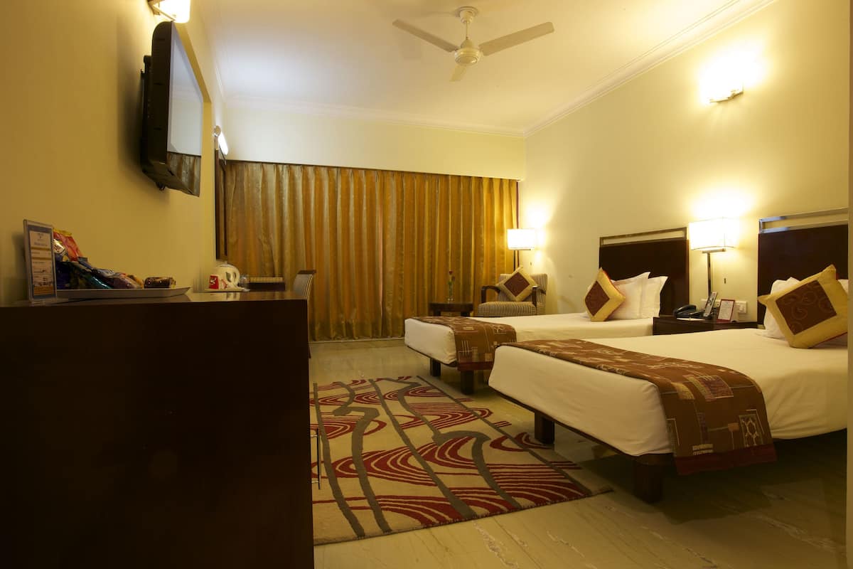 Deluxe Room | Frette Italian sheets, pillowtop beds, minibar, in-room safe