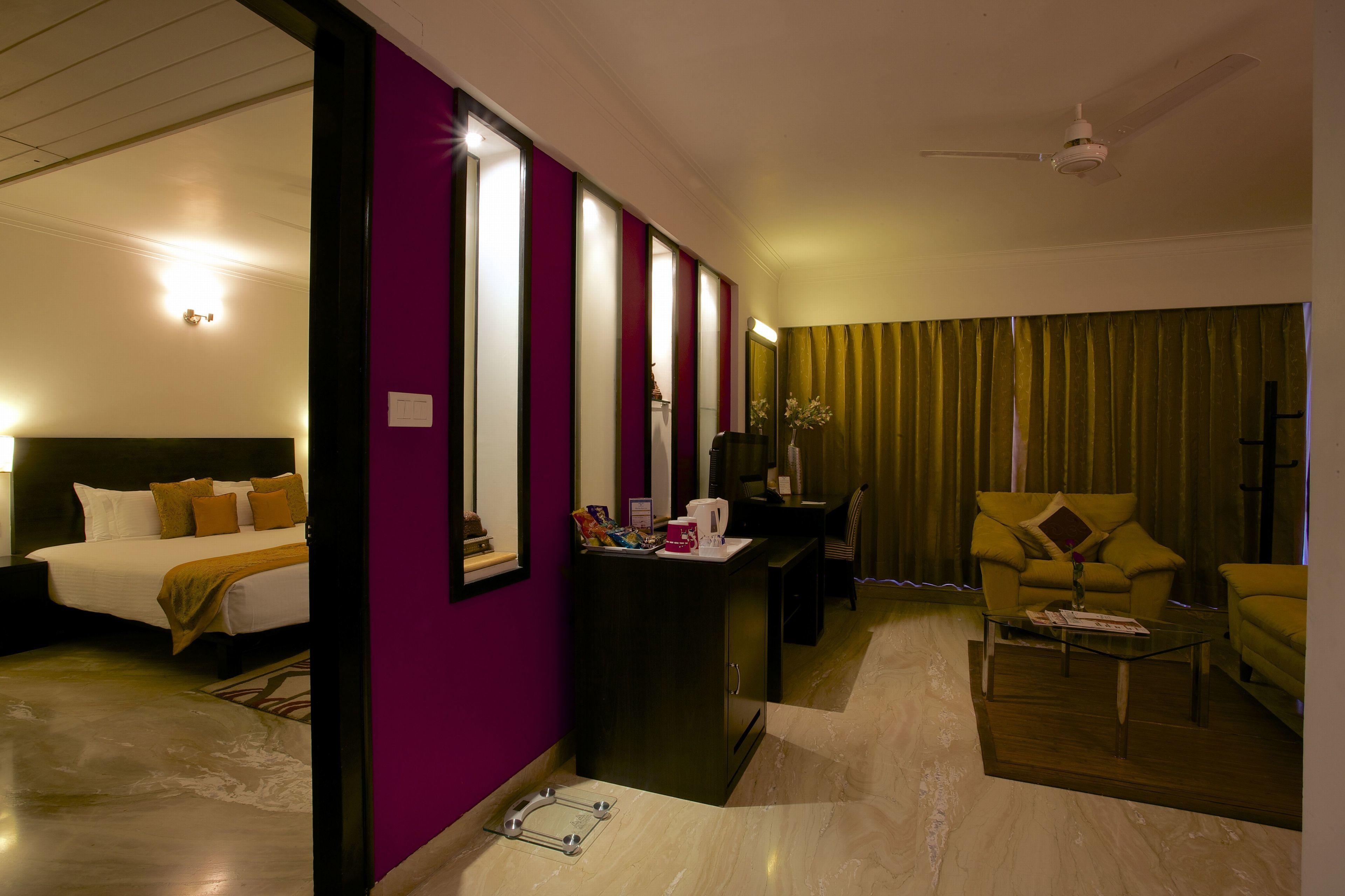 deluxe room | living room | 32-inch lcd tv with satellite channels, tv