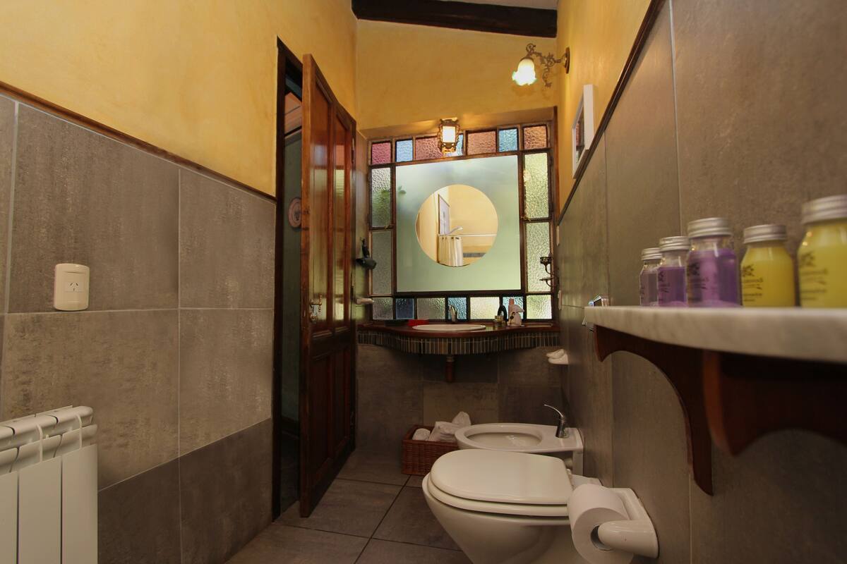 suite (abedules) | bathroom | rainfall showerhead, eco-friendly toiletries, hair dryer, bidet